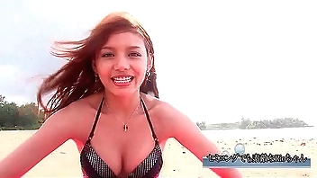 Get wet and wild with a hot Asian solo girl's outdoor body posing