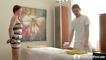 Masseur slides his cock in while working