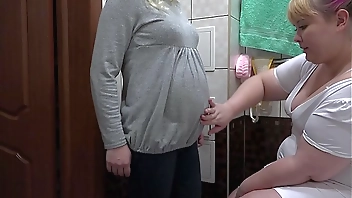 A nurse makes for a pregnant milf milky enema in hairy pussy and massages her vagina. Procedures unexpectedly end in orgasm. Fetish lesbians.