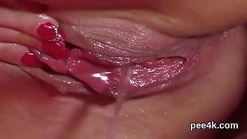 Glamorous looker gets her wet snatch entire of warm pee and ejaculates