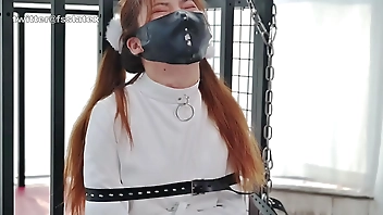 asian latex catsuit woman straitjacket bondage
