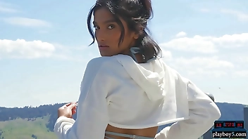 Indian MILF model stripteasing outdoor and plays with a hose