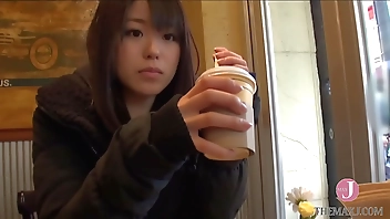 When playing with her soggy pussy with hand, she comes more seriously, and does not hesitate to touch cock and suck it into her mouth.